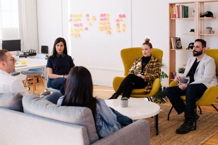 People in a room for a meeting