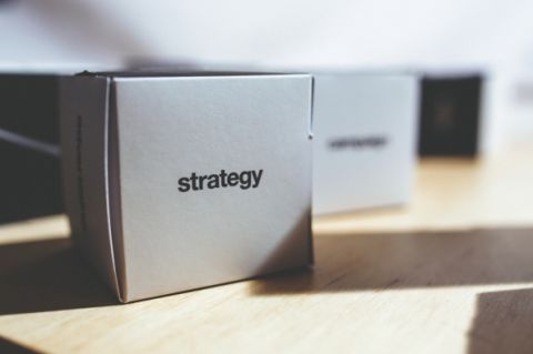 A box with the word strategy on it