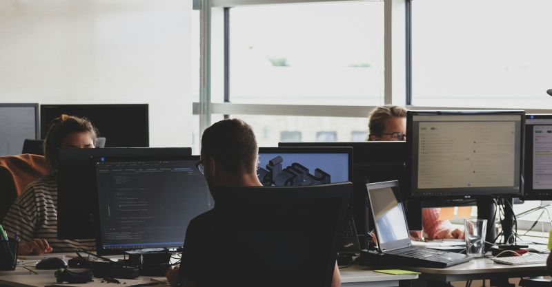 Office workers working at their computers.