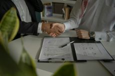 handshake over a contract https://unsplash.com/photos/two-people-shaking-hands-over-a-piece-of-paper-4mEyvORkbN0