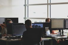 Office workers working at their computers.